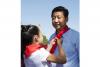 5月29日，中共中央总书记、国家主席、中央军委主席习近平在北京市少年宫参加“快乐童年放飞希望”主题队日活动。这是少先队员为习近平佩戴上红领巾。 