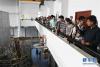 7月11日，“未来科学家”国际夏令营营员在中国科学院强磁场科学中心参观。新华社记者 张端 摄