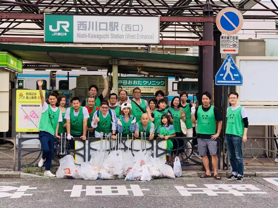 这些华人志愿者为何在日本“捡垃圾”?行胜于言 国家品牌网