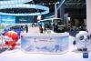 11月7日在第四届进博会汽车展区丰田展台拍摄的的“冰墩墩”和“雪容融”。新华社记者 孟涛 摄